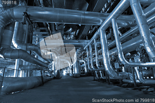 Image of Equipment, cables and piping as found inside of a modern industr