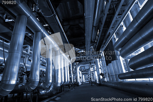 Image of Equipment, cables and piping as found inside of a modern industr
