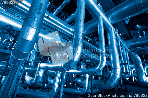 Image of Equipment, cables and piping as found inside of a modern industr