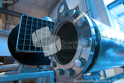 Image of Pipes, tubes, machinery and steam turbine at a power plant
