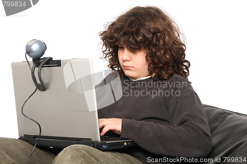 Image of boy using laptop