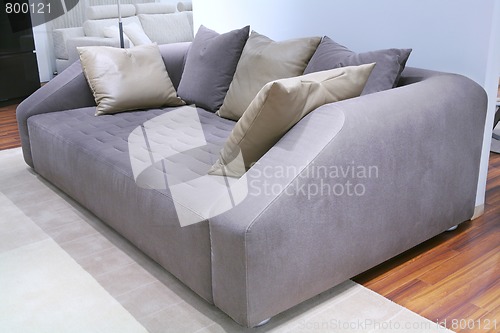 Image of sofa and many pillows