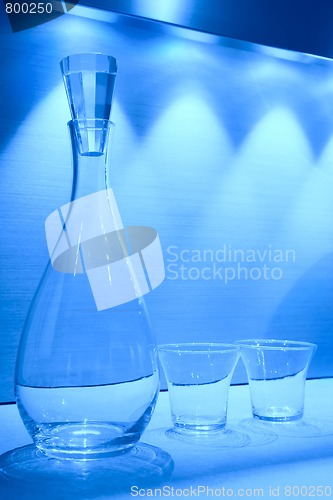 Image of glass carafe and two glasses