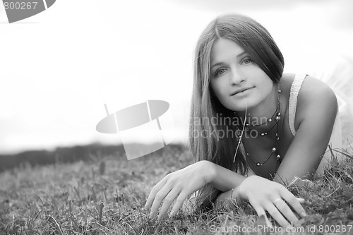 Image of girl lying on herb