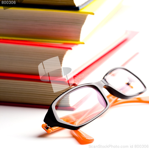 Image of books and glasses