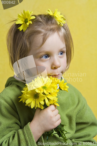 Image of Girl and yellow flowers