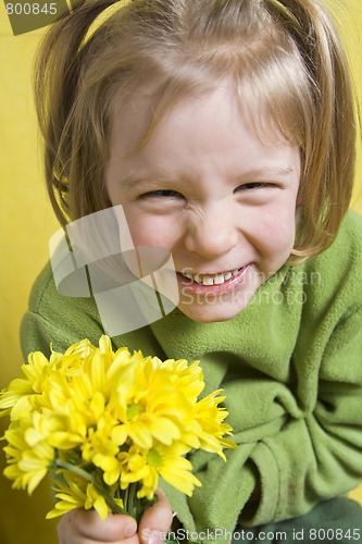 Image of Girl and yellow flowers