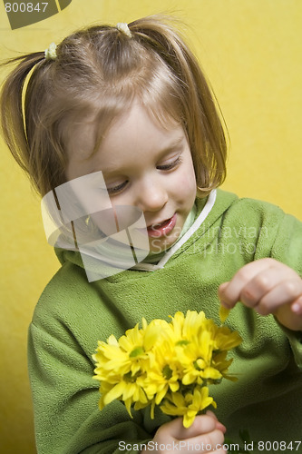 Image of Girl and yellow flowers