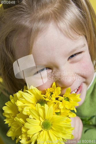 Image of Girl and yellow flowers