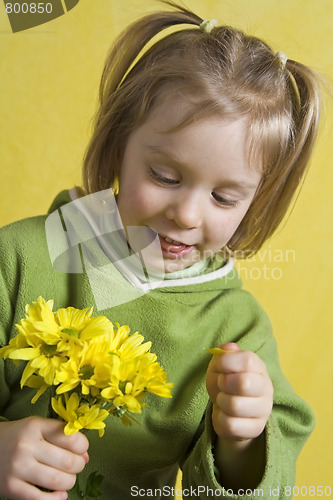 Image of Girl and yellow flowers
