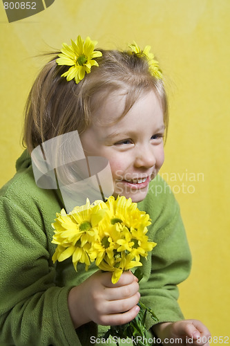 Image of Girl and yellow flowers