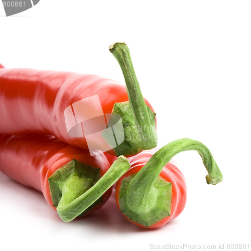 Image of three red chili peppers