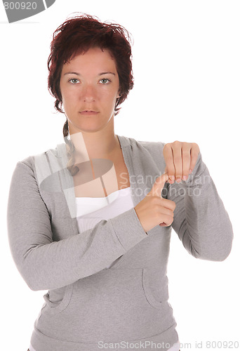 Image of hand demonstrating, "Q" in the alphabet of signs 
