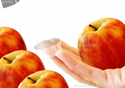 Image of Red-yellow apple in hand