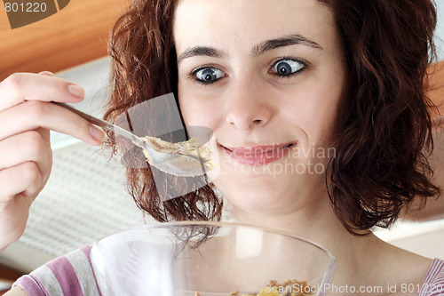 Image of Young people eating milk with cereals