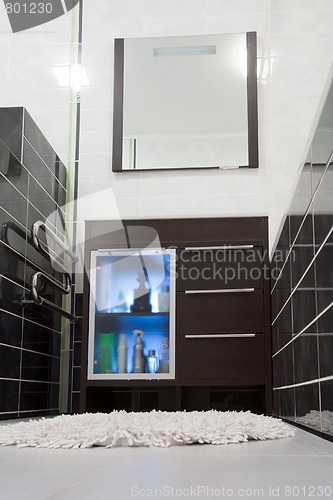 Image of Toiletries in bathroom cabinet