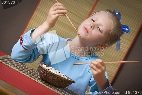 Image of Eating rice