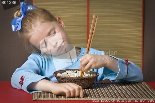 Image of Eating rice