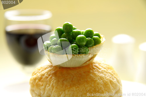 Image of Green Peas On Onion