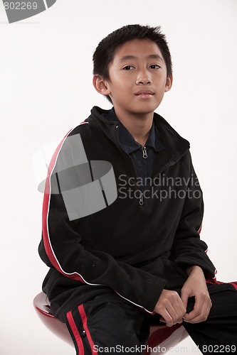 Image of Young cute pre-teen asian boy
