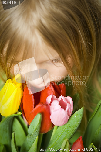Image of Girl and tulps