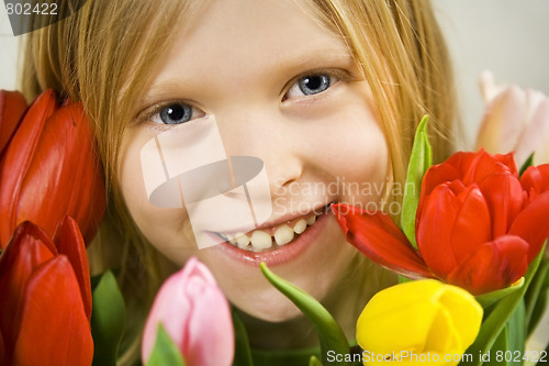 Image of Girl and tulps