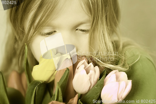 Image of Girl and tulps