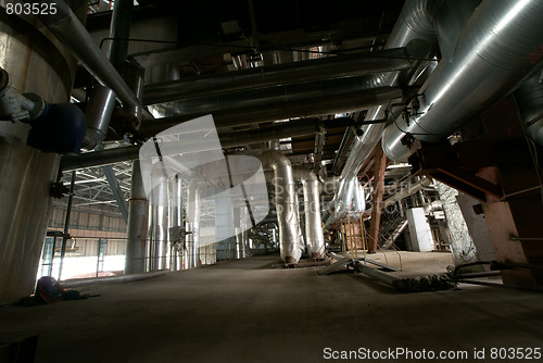 Image of Equipment, cables and piping as found inside of a modern industr