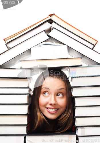 Image of Woman surrounded by books