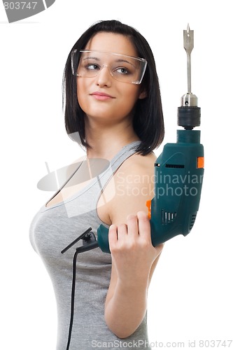 Image of Beautiful woman hold drill
