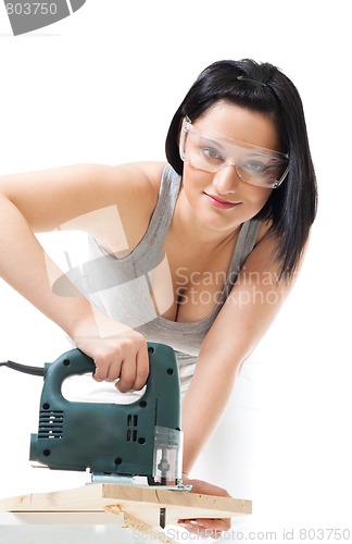 Image of Positive woman work with wood