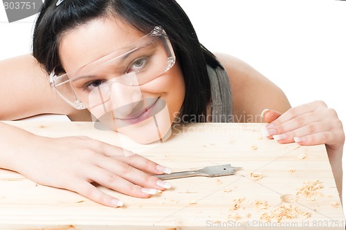 Image of Woman with drill for wood