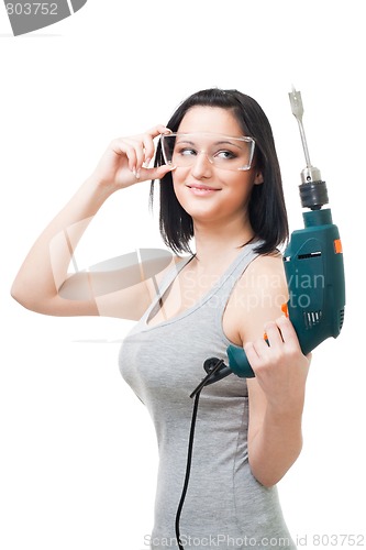 Image of Positive woman hold drill