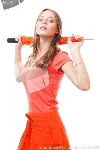 Image of Beautiful woman with orange umbrella