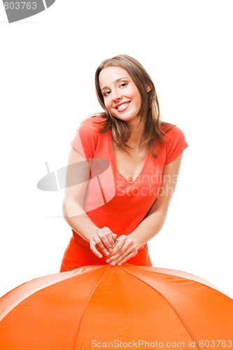 Image of Playful smile girl with umbrella