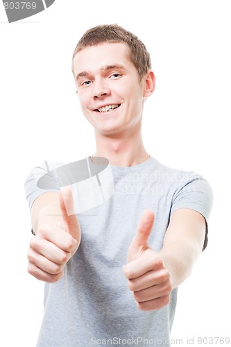 Image of Young man show thumb up gesture