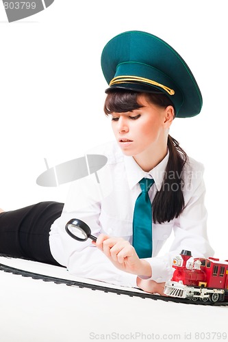 Image of Railroad worker investigate track