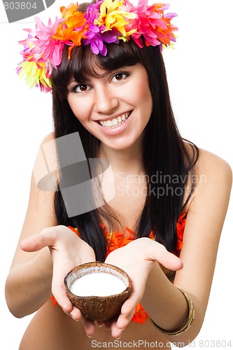 Image of Woman in costume of flowers offer coconut milk