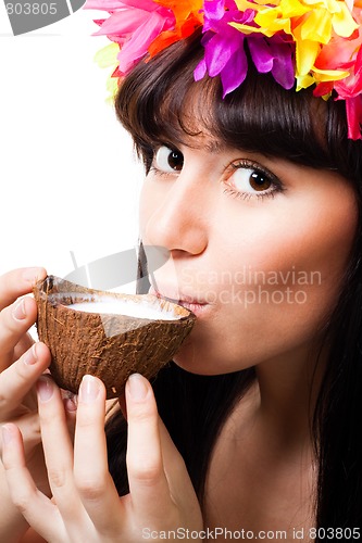 Image of Face of a young woman drink coconut milk