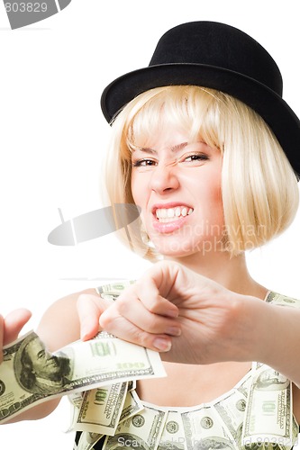Image of Angry woman tear dollar apart