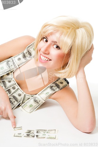 Image of Woman fit puzzle of dollar