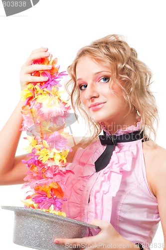 Image of Magic with hat and flowers