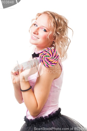 Image of Happy girl with candy