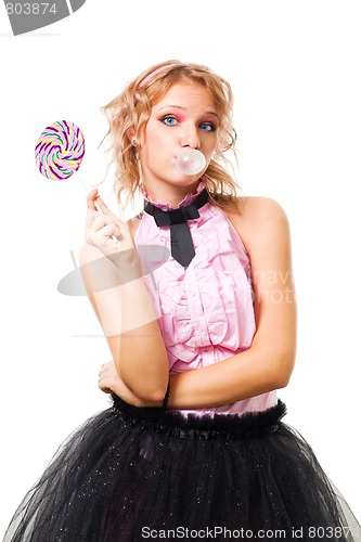 Image of Woman blow up gum and hold candy