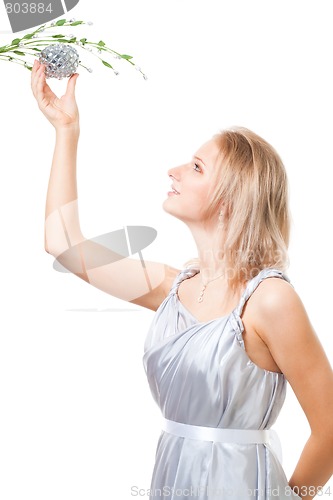 Image of Woman tear away apple in Eden garden