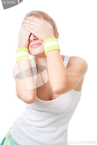 Image of Woman close eyes with hands wearing sports wear