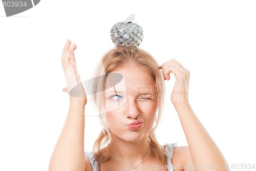 Image of woman with apple on her head