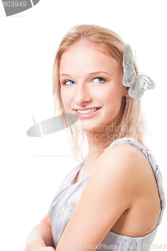 Image of blond woman with butterfly in her hairs