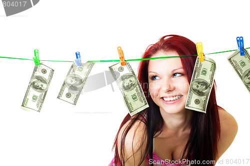 Image of Shocked woman with cash wash money