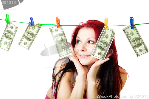 Image of Shocked woman with cash wash money